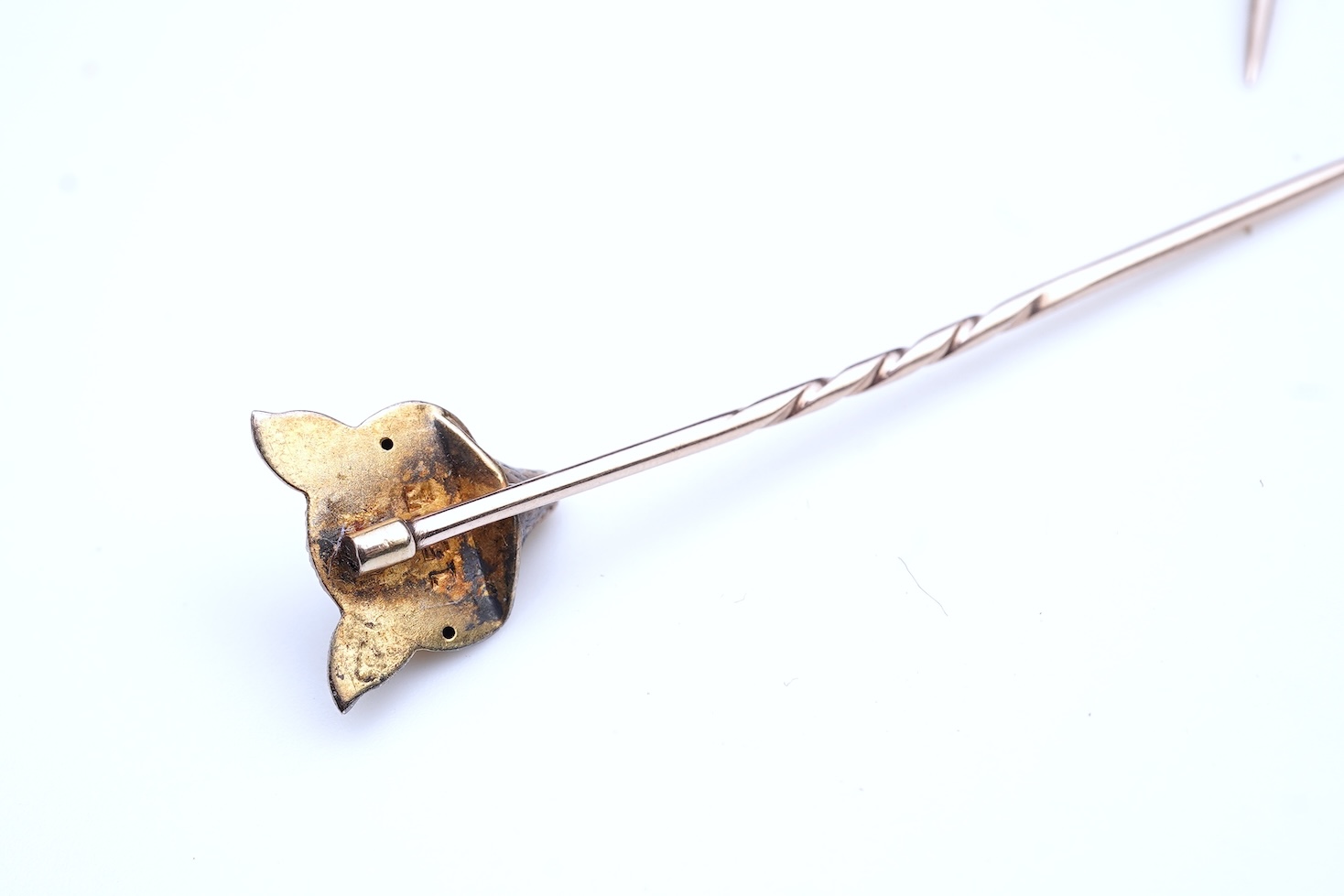 A collection of eight tie pins, 19th and 20th century